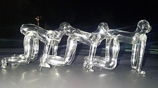 Illustration for article titled This Human Centipede-inspired glass pipe just sucks